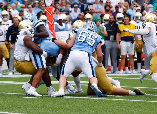 Corey Gaynor (65) has started every game at center the last two seasons for the Tar Heels.