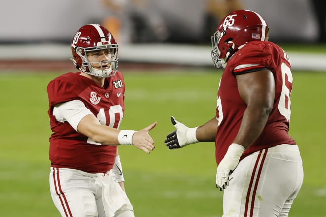 Alabama Crimson Tide quarterback Mac Jones and offensive lineman Deonte Brown. Photo | Getty Images 