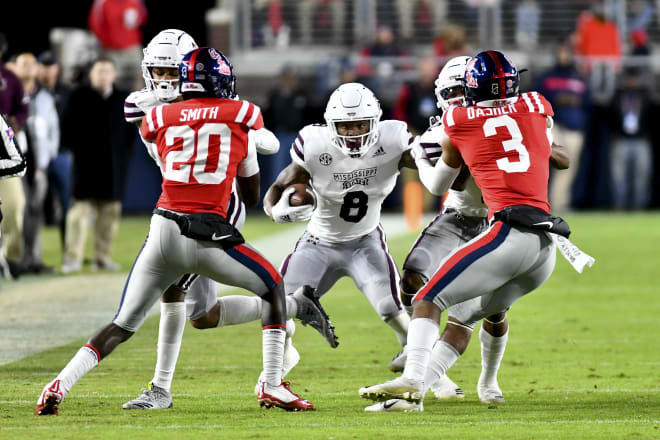 Ole Miss defensive back Vernon Dasher (3) works to make a tackle during the Rebels' Egg Bowl loss to Mississippi State last November. Dasher and the Rebels are prepping for the Grove Bowl on April 6.
