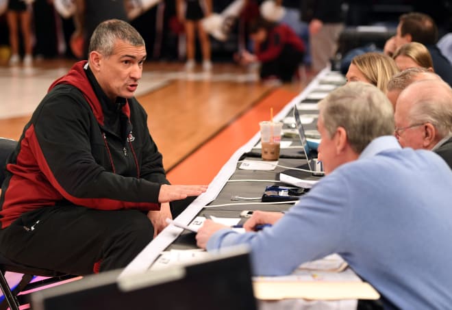Frank Martin talks to the TBS crew (Jim Spanarkel and Verne Lundquist) at Thursday's open practice. 
