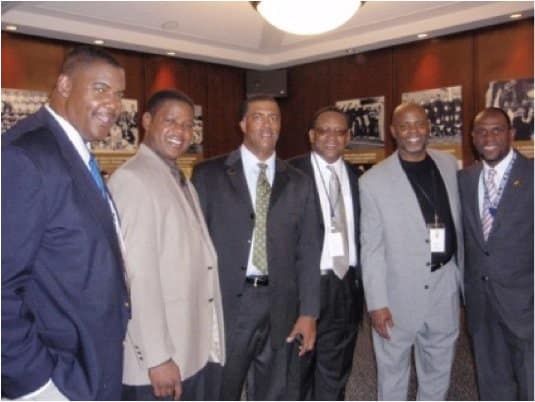 Mitchell (second from left) was at last year's 40-year national champion reunion with former backfield mates Jm Stone middle), Jerome Heavens (third from right) and Vagas Ferguson (second from right).