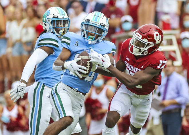 Former Tulane Green Wave defensive back Jadon Canady (28) intercepts a pass intended for Oklahoma Sooners wide receiver Marvin Mims (17) during the first quarter at Gaylord Family-Oklahoma Memorial Stadium on Sept. 4, 2021. Mandatory Credit: Kevin Jairaj-USA TODAY Sports