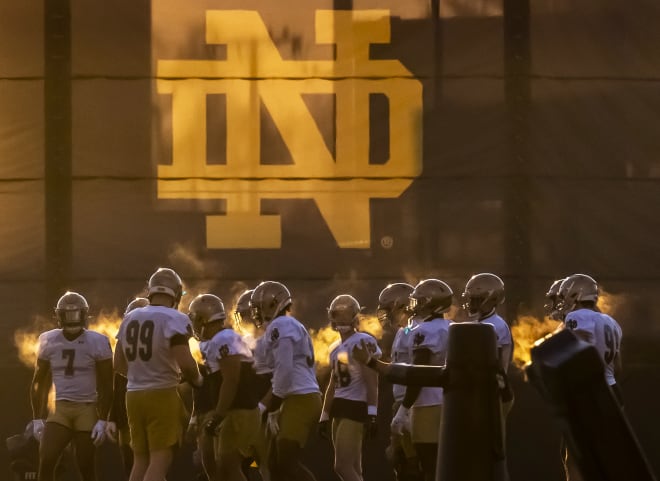 Notre Dame defensive linemen go through drills during spring practice on March 17.