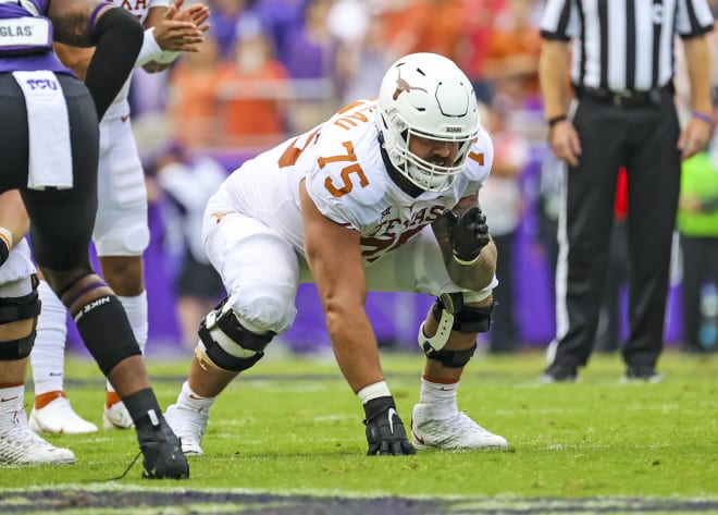 Former Texas OL Junior Angilau (USA Today Sports)