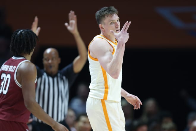 Jan 30, 2024; Knoxville, Tennessee, USA; Tennessee Volunteers guard Dalton Knecht (3) reacts after hitting a three pointer against the South Carolina Gamecocks during the first half at Thompson-Boling Arena at Food City Center.
