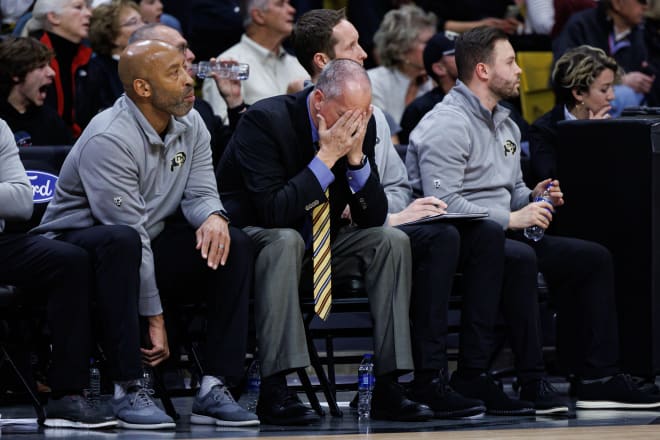 Head coach Tad Boyle holds his hands to his face during the Washington game on Jan. 19