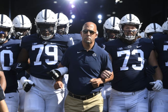 Penn State coach James Franklin leads the Nittany Lions onto the field prior to the Ball State game. AP photo
