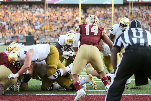 Tony Jones Jr. bulls in for a score at Boston College. The Irish have been much more physical than finesse in the red-zone to tie for No. 1 nationally so far.
