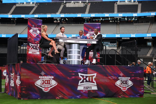 Head coach Deion Sanders talks with ESPN at Big 12 Media Days  in Las Vegas on Wednesday.