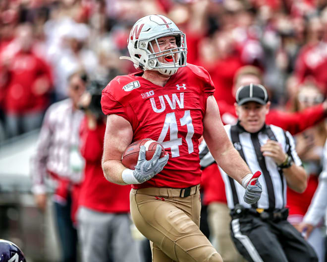 Wisconsin outside linebacker Noah Burks during his pick-six against Northwestern on Sept. 28.