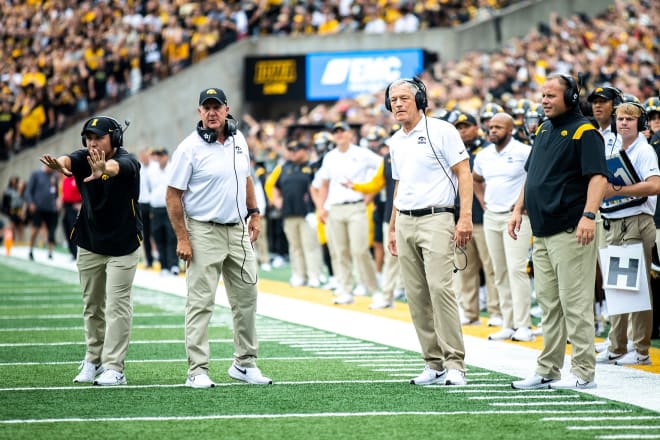 Iowa defensive coordinator Phil Parker, second from left, stands next to Iowa head coach Kirk Ferentz during a game against Iowa State at Kinnick Stadium in 2022.