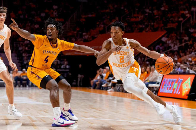 Tennessee guard Jordan Gainey (2) drives on Tennessee Tech’s Josiah Davis (4) during the second half of the Vols’ 80-42 win over the Golden Eagles on Nov. 6 at Food City Center.