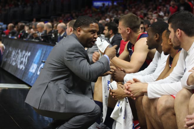 Arizona assistant coach Emanuel "Book" Richardson was one of four college coaches charged Tuesday.