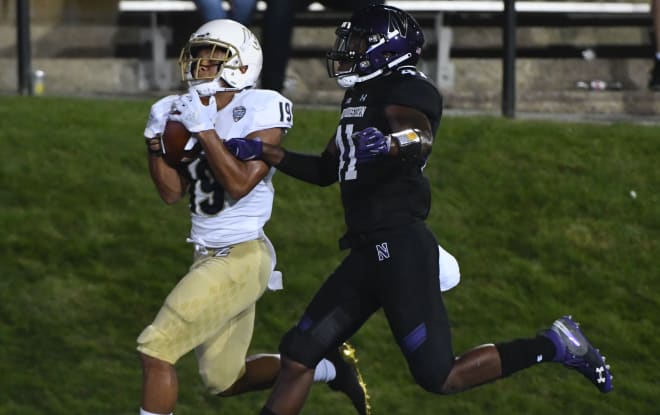 Akron's Andre Williams catches a 25-yard TD pass over Jared McGee.