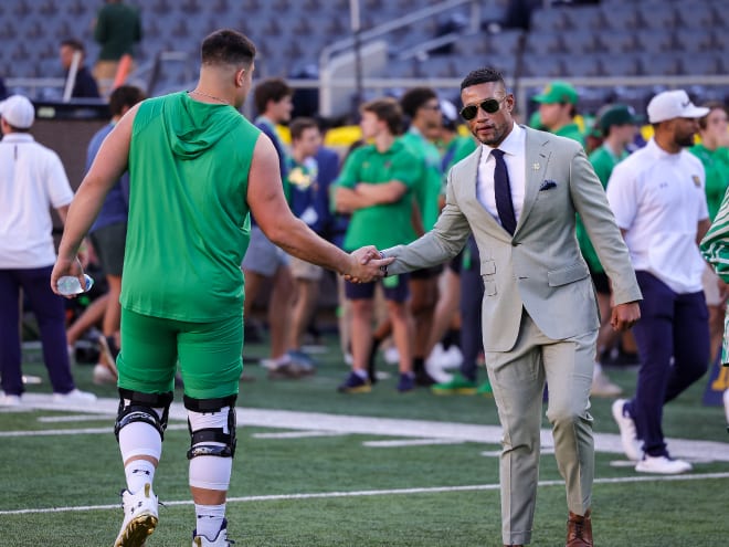 Notre Dame head coach Marcus Freeman (right) will make a trip to Missouri to see 2025 offensive tackle target Jack Lange.