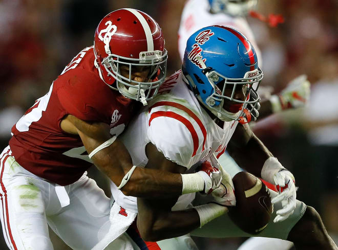 Alabama cornerback Anthony Averett (28) breaks up a pass against Ole Miss. Photo | Getty Images