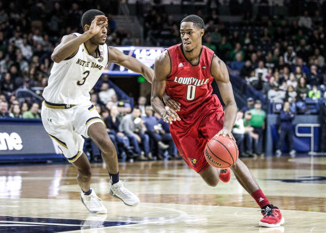 Louisville's V.J. King drives by Notre Dame's V.J. Beachem during the Jan. 4 matchup in South Bend.