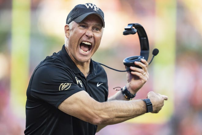 An angry Wake Forest head coach Dave Clawson is shown here Saturday arguing with an official in Death Valley.