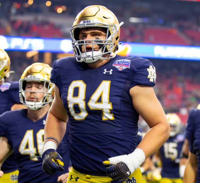Notre Dame tight end Kevin Bauman (84) jogs onto the field for ND's Jan. 1 Fiesta Bowl matchup with Oklahoma State.