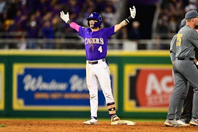 LSU's Jordan Thompson stands on second base after his three-run double in the eighth broke a 2-2 tie for an eventual 5-2 SEC win over Tennessee Thursday night in Alex Box Stadium.
