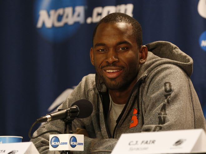 Mar 19, 2014; Buffalo, NY, USA; Syracuse Orange center Baye-Moussa Keita (12) speaks to the media before the second round of the 2014 NCAA Basketball Tournament at First Niagara Center. Mandatory Credit: Kevin Hoffman-USA TODAY Sports