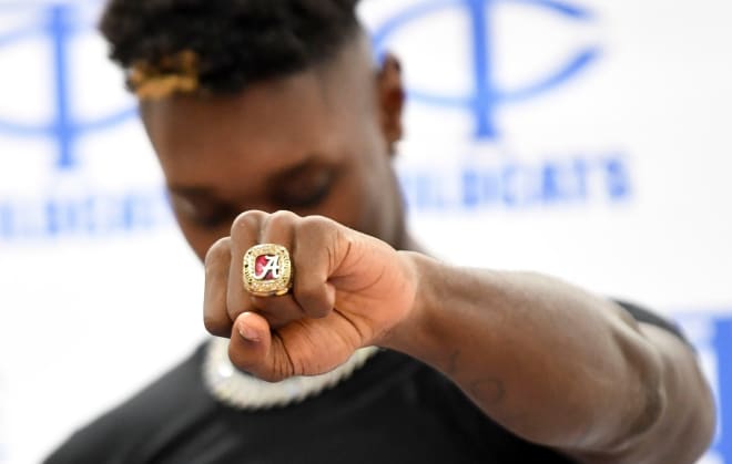 Tuscaloosa County High player Kevin Riley revealed his intention to play for the University of Alabama during Early Signing Day at Tuscaloosa County High School in Northport, Alabama. Riley sports an Alabama Crimson Tide ring during the ceremony. Photo | Gary Cosby-Tuscaloosa News