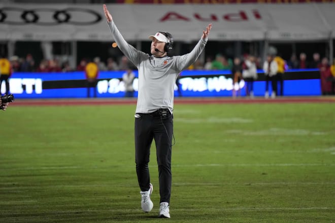 Lincoln Riley engages the crowd Saturday during USC's game with Notre Dame in the Coliseum.