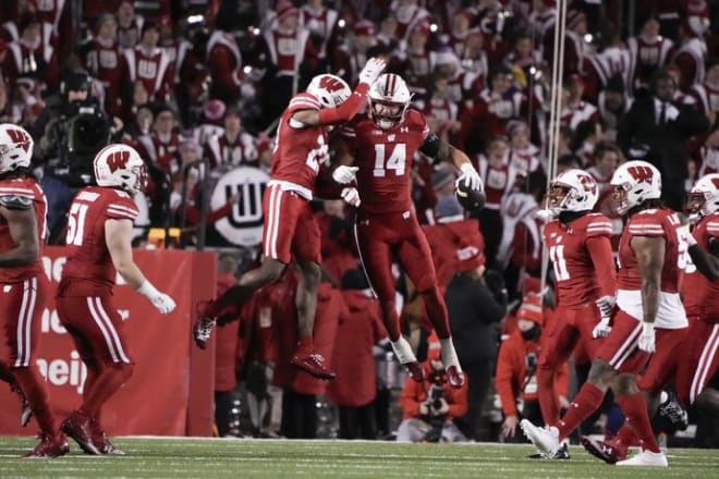 Wisconsin safety Preston Zachman celebrates his pick off Kyle McCord. 