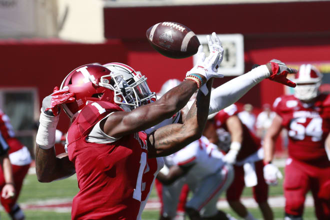 Indiana wide receiver Whop Philyor lets a ball go through his hands during Indiana's 51-10 loss to Ohio Sate on Saturday. (USA Today Images)