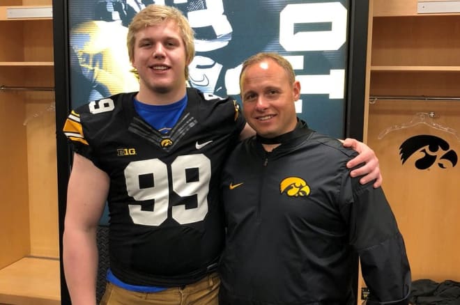 Rylie Mills with Iowa assistant coach Seth Wallace at the Hawkeyes' junior day