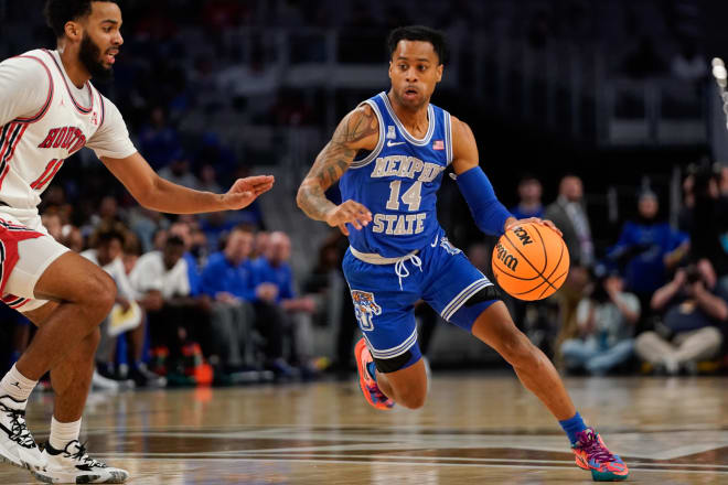 The South Florida Bulls added Memphis Tigers guard Tyler Harris (14) via the transfer portal.