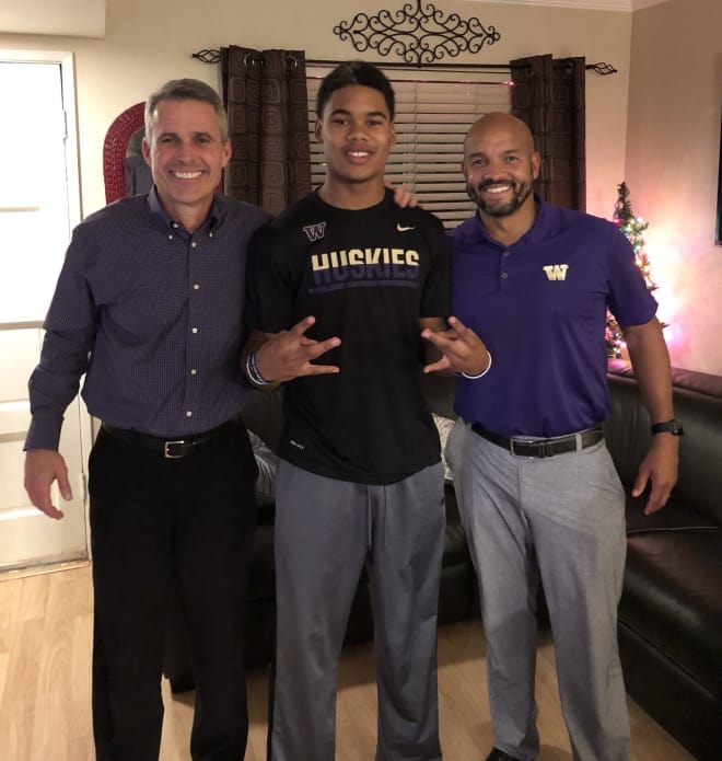L-R: UW head coach Chris Petersen, four-star safety Julius Irvin, and UW defensive backs coach Jimmy Lake during an in-home visit in January.