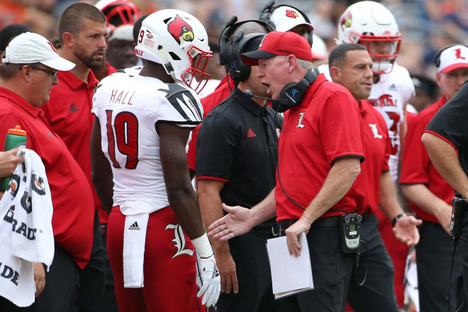 Bobby Petrino previously coached at Louisville twice and at Arkansas.