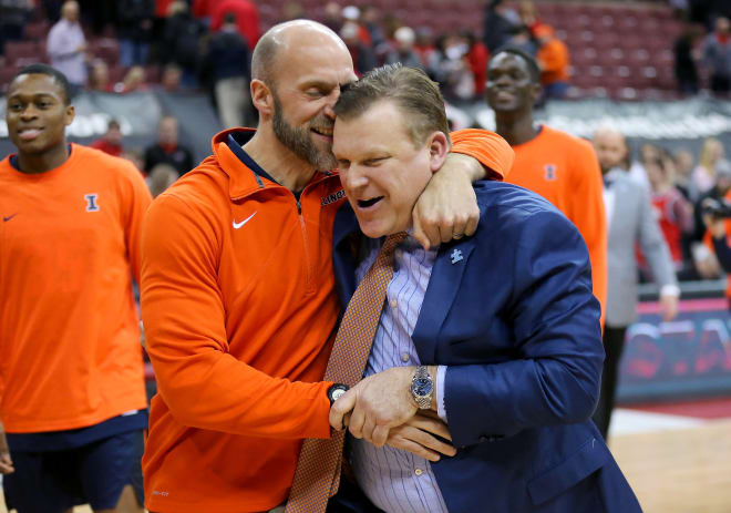 Illinois Fighting Illini head coach Brad Underwood (right) gets a hug from Athletic Director Josh Whitman after the win against the Ohio State Buckeyes at Value City Arena. 