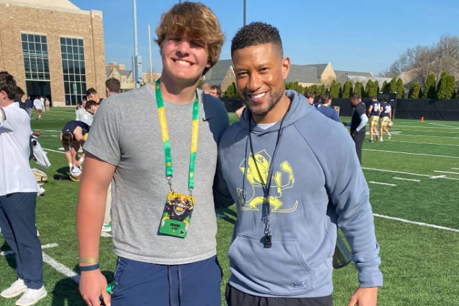 Gregory Patrick, pictured above with head coach Marcus Freeman, returned to Notre Dame this week after visiting the Irish last season. Patrick said the coaches were great and practice intensity was second to none.