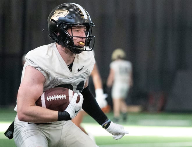 Purdue Boilermakers defensive back Dillon Thieneman (31) runs with the ball during Purdue football practice, Tuesday, March 19, 2024, at Mollenkopf Athletic Center in West Lafayette, Ind.