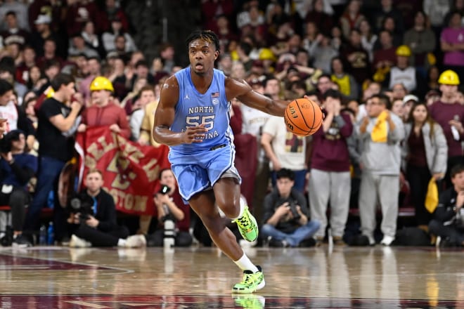UNC's Harrison Ingram brings the ball up the court against Boston College. 