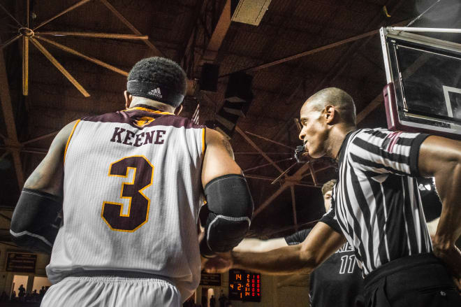 Marcus Keene went to the bench with 7 minutes left in the first half after committing 3 fouls. [Photo by Zach Libby] 