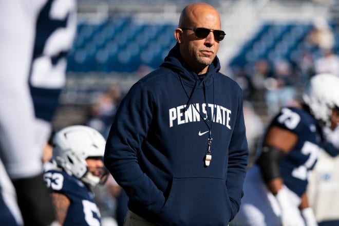 Penn State head football coach James Franklin walks through team warmups before an NCAA football game against Rutgers Saturday, Nov. 18, 2023, in State College, Pa. The Nittany Lions won, 27-6.