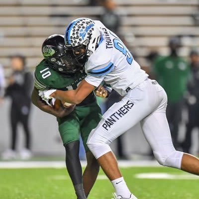 Notre Dame freshman defensive end Loghan Thomas (right) makes a tackle during his junior season at Katy (Texas) Paetow High in 2022.