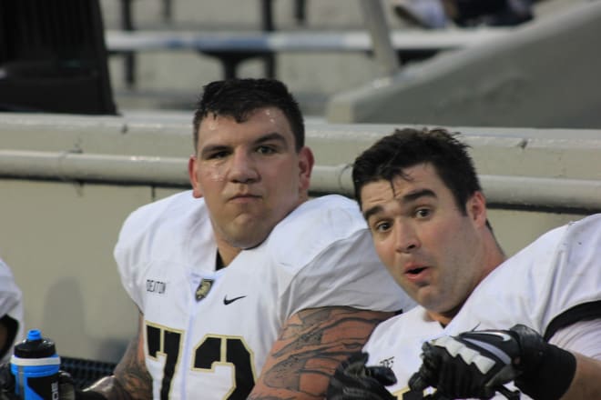 Two members of the O-line in OT, Jaxson Deaton and Center Jack Sides getting break on Friday