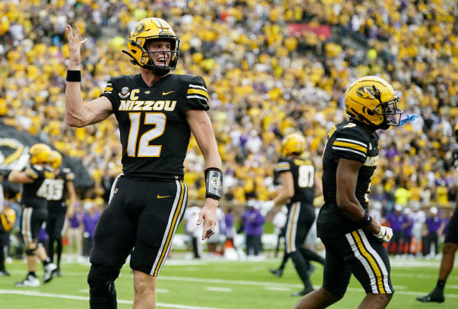 Cook celebrates his touchdown run, one of three scoring plays on the day (Photo: J. Biggerstaff/USA Today)