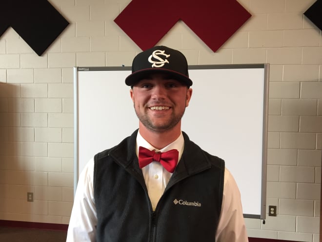 Left-handed pitcher Corey Stone is all smiles after signing with the Gamecocks at his high school (Mid-Carolina) Wednesday afternoon.