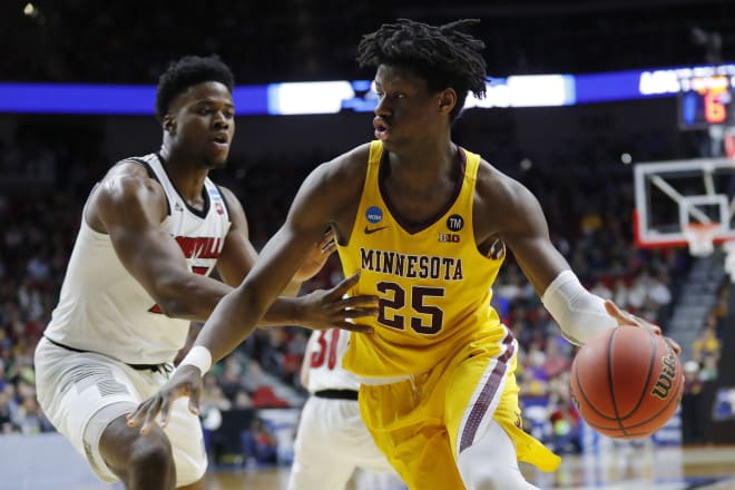 Daniel Oturu leads the Big Ten in rebounding (11.4) and is second in scoring.