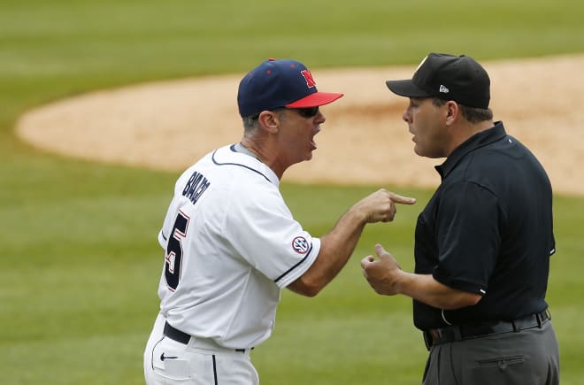 Ole Miss coach Mike Bianco argues with an umpire during a game last season.