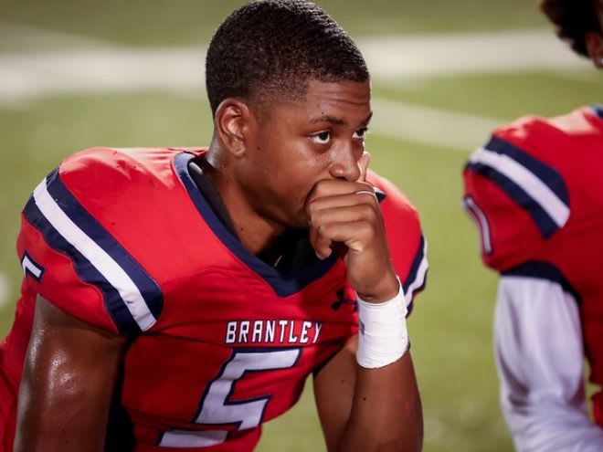 Dual-Threat QB Braxton Woodson is pondering his college future