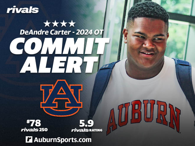 Four-star offensive lineman DeAndre Carter has committed to Auburn.