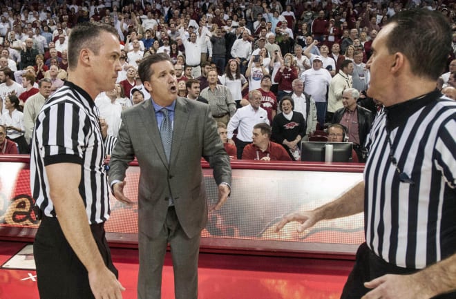 John Calipari argues with referees as Kentucky head coach during an 87-85 loss to Arkansas in the famous Michael Qualls dunk game on Jan. 14, 2024, at Bud Walton Arena in Fayetteville. 