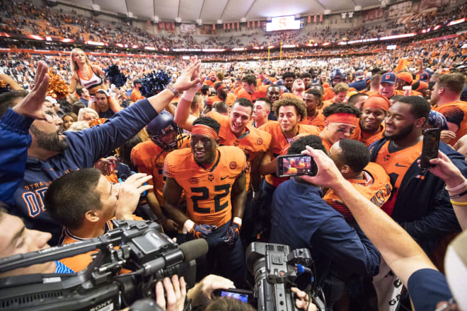 Syracuse players are shown here in the Carrier Dome following an upset of No. 2 Clemson on October 13, 2017.