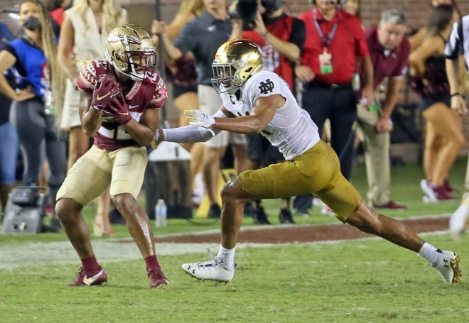 Notre Dame junior safety Kyle Hamilton goes for a tackle against Florida State. 